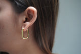 Gold O hoop earrings