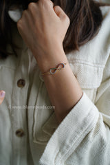 Multicolored infinity bracelet