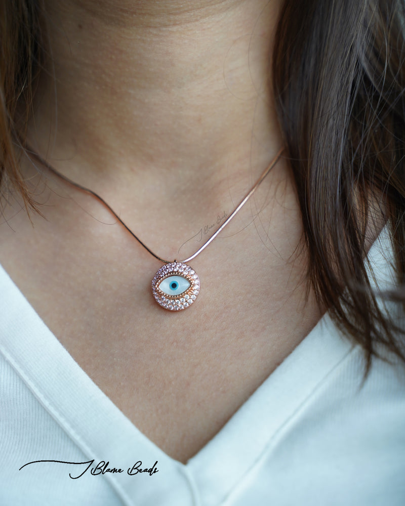 Gazing evil eye rose gold necklace