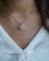 Gazing evil eye rose gold necklace