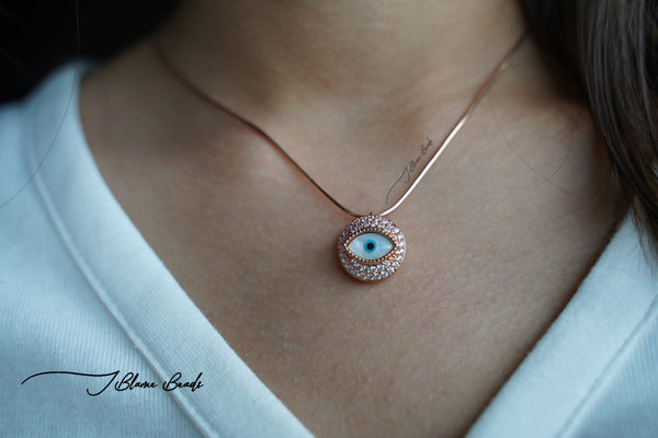 Gazing evil eye rose gold necklace