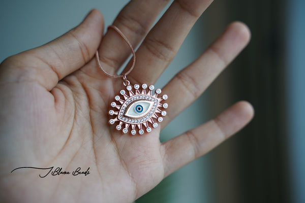 Rose gold star evil eye necklace