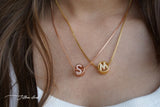 Circular studded initial necklace