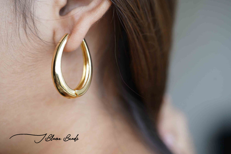 Gold chand bali earrings